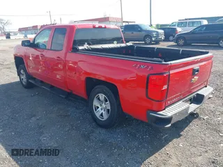 2018 Chevrolet Silverado 1500 LT with VIN 1GCVKREH2JZ264045, listed as a IAAI auction lot 42020426 with 135,719 mi miles and . Bid and sale history available at DreamBid. Image 3.