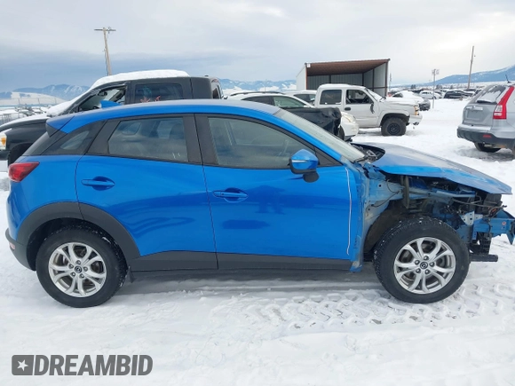 2016 Mazda CX-3 Touring z VIN JM1DKFC72G0138818, wystawiony jako IAAI lot #41371058 z przebiegiem 44 309 mil mil oraz . Historia ofert i sprzedaży dostępna na DreamBid. Obrazek 14.