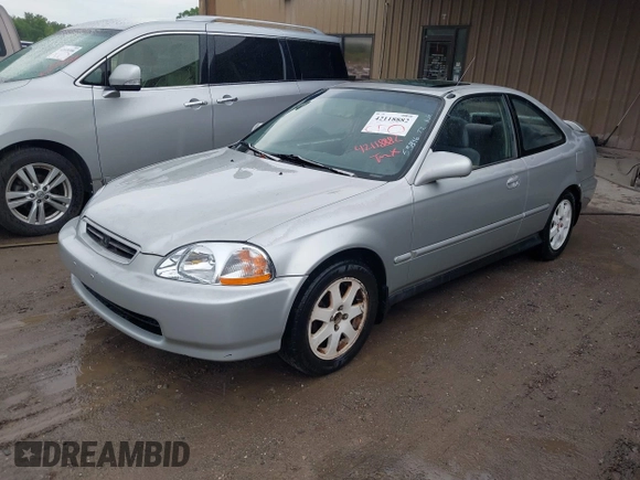 1997 Honda Civic EX z VIN 1HGEJ8144VL050538, wystawiony jako IAAI lot #42118882 z przebiegiem 384 347 mil mil oraz . Historia ofert i sprzedaży dostępna na DreamBid. Obrazek 2.