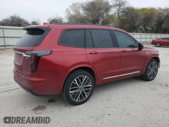 2023 Cadillac XT6 AWD Sport z VIN 1GYKPGRS5PZ221207, wystawiony jako Copart lot #41876425 z przebiegiem 23 193 mil mil oraz Szkody całkowita. Historia ofert i sprzedaży dostępna na DreamBid. Obrazek 3.