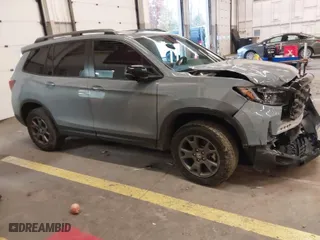 2024 Honda Passport TrailSport with VIN 5FNYF8H67RB005283, listed as a IAAI auction lot 41123183 with 1 mi miles. Bid and sale history available at carsss.com. Image 1.