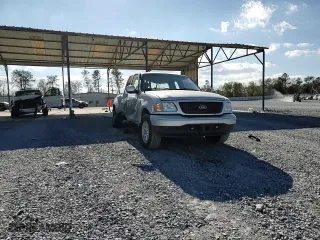 2003 Ford F-150 XL with VIN 1FTRX07W03KB17955, listed as a Copart auction lot 83061424 with 164,529 mi miles and Salvage Title. Bid and sale history available at carsss.com. Image 10.