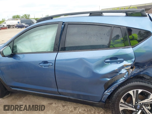 2024 Subaru Crosstrek Premium z VIN JF2GUADC6RH338290, wystawiony jako IAAI lot #42341194 z przebiegiem 10 379 mil mil oraz . Historia ofert i sprzedaży dostępna na DreamBid. Obrazek 15.