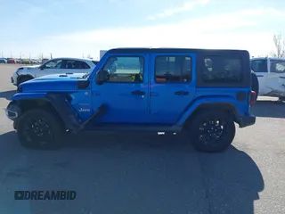 2023 Jeep Wrangler Sahara z VIN 1C4JJXP60PW513969, wystawiony jako IAAI lot #41766631 z przebiegiem 34 819 mil mil oraz . Historia ofert i sprzedaży dostępna na DreamBid. Obrazek 15.
