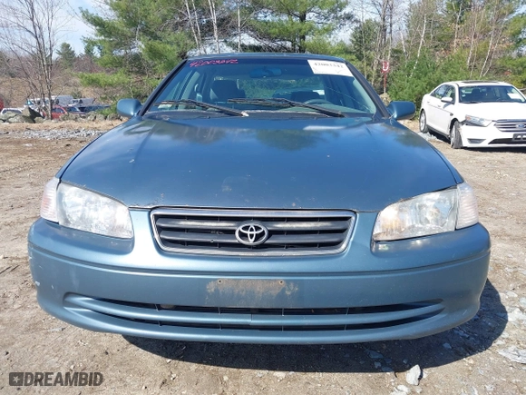 2000 Toyota Camry CE with VIN 4T1BG22KXYU730531, listed as a IAAI auction lot 42003342 with 248,235 mi miles. Bid and sale history available at carsss.com. Image 12.