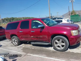 2007 Chevrolet Suburban LT with VIN 3GNFK16347G260507, listed as a IAAI auction lot 42551224 with 208,824 mi miles and . Bid and sale history available at DreamBid. Image 13.