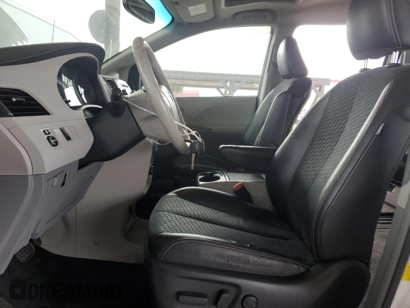 2012 Toyota Sienna SE with VIN 5TDXK3DC9CS215991, listed as a Copart auction lot 51868005 with 215,075 mi miles and Salvage title. Bid and sale history available at DreamBid. Image 7.