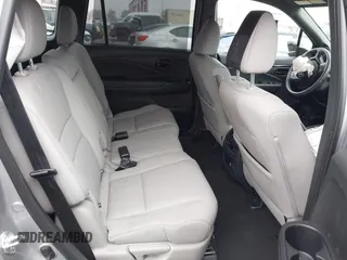 2023 Honda Passport Elite with VIN 5FNYF8H02PB029127, listed as a IAAI auction lot 41166484 with 16,200 mi miles and . Bid and sale history available at DreamBid. Image 8.
