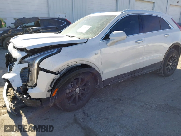 2022 Cadillac XT4 AWD Luxury with VIN 1GYFZBR42NF170554, listed as a IAAI auction lot 41409705 with 38,727 mi miles and . Bid and sale history available at carsss.com. Image 18.