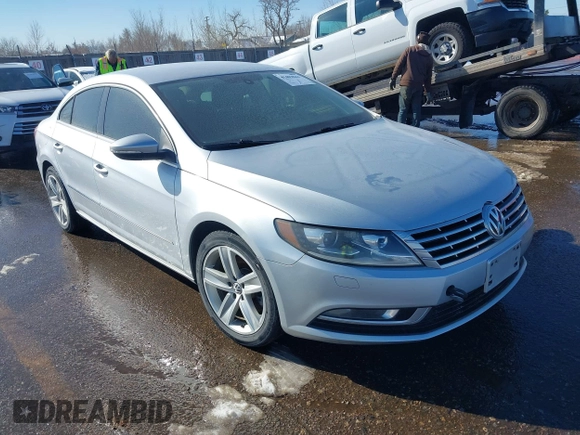 2014 Volkswagen CC Sport with VIN WVWBP7AN5EE508465, listed as a IAAI auction lot 41403844 with 97,445 mi miles and . Bid and sale history available at DreamBid. Image 1.