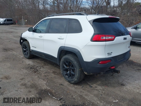 2014 Jeep Cherokee Trailhawk with VIN 1C4PJMBS5EW240375, listed as a IAAI auction lot 41806725 with 127,705 mi miles. Bid and sale history available at carsss.com. Image 3.