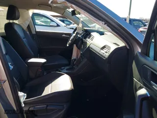 2020 Volkswagen Tiguan SE with VIN 3VV2B7AX4LM081188, listed as a IAAI auction lot 41655478 with 63,593 mi miles. Bid and sale history available at carsss.com. Image 5.