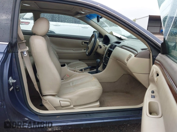 1999 Toyota Solara SE with VIN 2T1CF22P9XC113933, listed as a IAAI auction lot 41975806 with 239,883 mi miles. Bid and sale history available at carsss.com. Image 5.