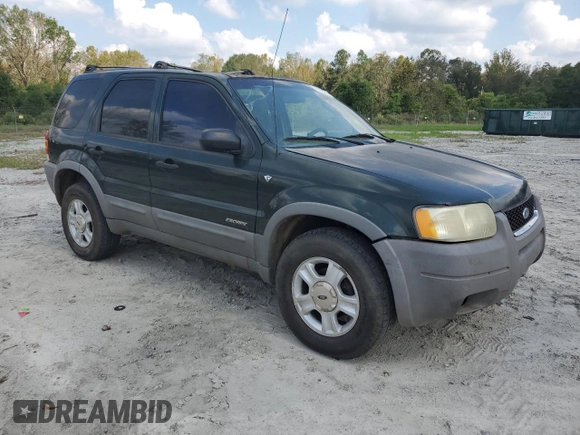 2001 Ford Escape XLT with VIN 1FMYU03161KC45236, listed as a Copart auction lot 75311644 with 271,155 mi miles and Salvage Title. Bid and sale history available at carsss.com. Image 4.