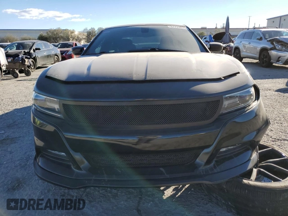 2015 Dodge Charger SXT with VIN 2C3CDXHG8FH769883, listed as a Copart auction lot 87723825 with 81,859 mi miles and Salvage Title. Bid and sale history available at DreamBid. Image 5.