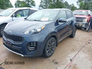 2019 Kia Sportage EX with VIN KNDPN3AC3K7569882, listed as a IAAI auction lot 42094311 with 67,816 mi miles and . Bid and sale history available at DreamBid. Image 2.