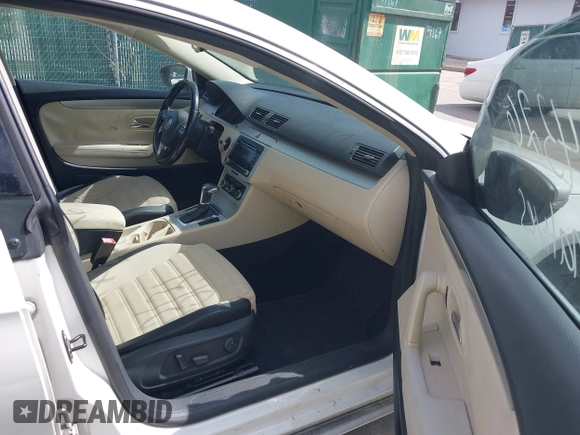 2010 Volkswagen CC Sport with VIN WVWML7AN5AE512367, listed as a IAAI auction lot 41924326 with 125,162 mi miles. Bid and sale history available at carsss.com. Image 5.