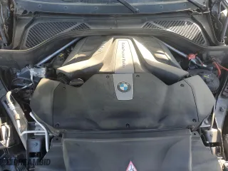2016 BMW X6 xDrive50i with VIN 5UXKU6C57G0R33958, listed as a Copart auction lot 49774065 with 124,226 mi miles and Salvage Title. Bid and sale history available at carsss.com. Image 12.