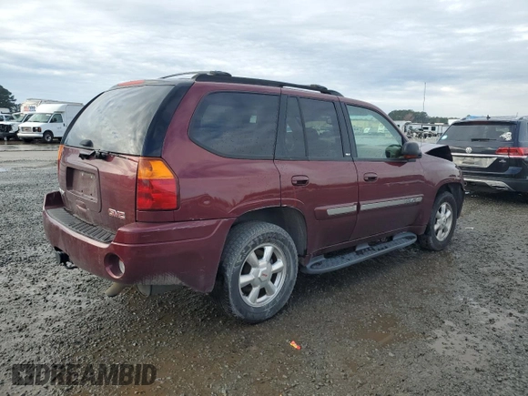 2003 GMC Envoy SLT with VIN 1GKDT13S032245485, listed as a Copart auction lot 84385304 with 139,183 mi miles and Salvage Title. Bid and sale history available at carsss.com. Image 3.