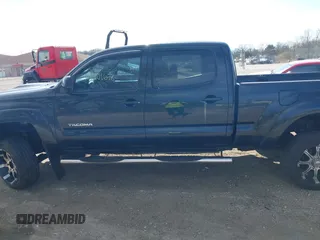 2009 Toyota Tacoma z VIN 5TEMU52N79Z662019, wystawiony jako IAAI lot #42101648 z przebiegiem 344 119 mil mil oraz . Historia ofert i sprzedaży dostępna na DreamBid. Obrazek 14.