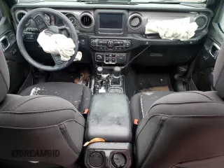 2023 Jeep Wrangler Sport Altitude with VIN 1C4HJXDN2PW569826, listed as a Copart auction lot 81825314 with 16,497 mi miles and Salvage Title. Bid and sale history available at DreamBid. Image 8.