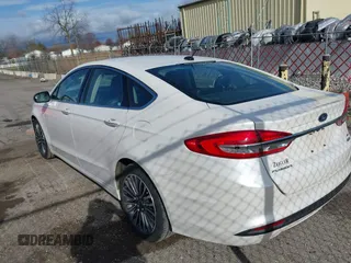 2018 Ford Fusion SE with VIN 3FA6P0HDXJR127018, listed as a IAAI auction lot 42013450 with 93,761 mi miles. Bid and sale history available at carsss.com. Image 3.