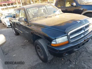 2000 Dodge Dakota Sport with VIN 1B7GG22N3YS697498, listed as a IAAI auction lot 40923958 with 1 mi miles. Bid and sale history available at carsss.com. Image 1.