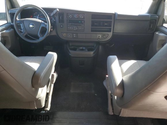2013 Chevrolet Express Passenger 1LT z VIN 1GAZGYFG5D1190358, wystawiony jako Copart lot #75496574 z przebiegiem 114 340 mil mil oraz Szkoda całkowita • Salvage title. Historia ofert i sprzedaży dostępna na DreamBid. Obrazek 8.