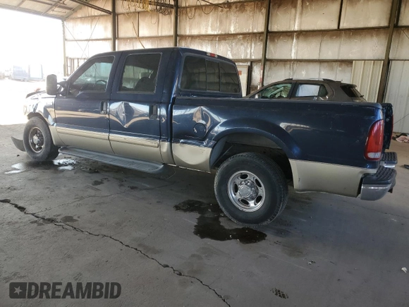 2001 Ford F-250 XL with VIN 1FTNW20L91EA06152, listed as a Copart auction lot 72660874 with 285,235 mi miles and Salvage title. Bid and sale history available at DreamBid. Image 2.