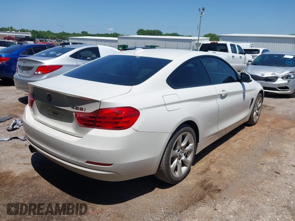 2015 BMW 4 Series 428i xDrive with VIN WBA3N5C58FK198596, listed as a IAAI auction lot 42514820 with 107,261 mi miles and . Bid and sale history available at DreamBid. Image 4.