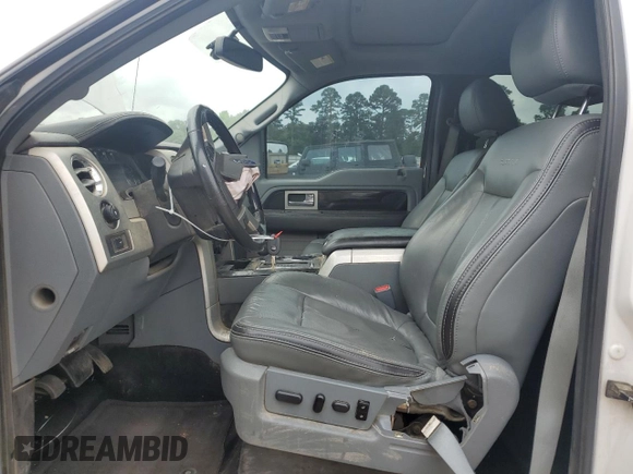 2011 Ford F-150 XLT with VIN 1FTFW1ET1BFD29677, listed as a Copart auction lot 54727835 with 155,367 mi miles and Salvage title. Bid and sale history available at DreamBid. Image 7.