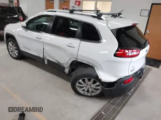 2014 Jeep Cherokee Limited with VIN 1C4PJMDS1EW235980, listed as a IAAI auction lot 41994044 with 128,292 mi miles and . Bid and sale history available at DreamBid. Image 3.