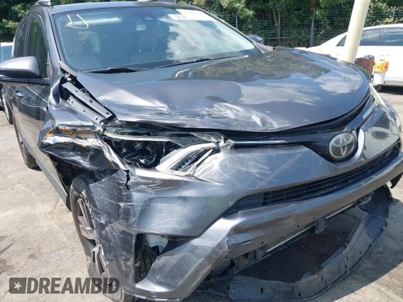2018 Toyota RAV4 XLE with VIN JTMWFREV9JJ201845, listed as a IAAI auction lot 42442303 with 111,177 mi miles and . Bid and sale history available at DreamBid. Image 6.