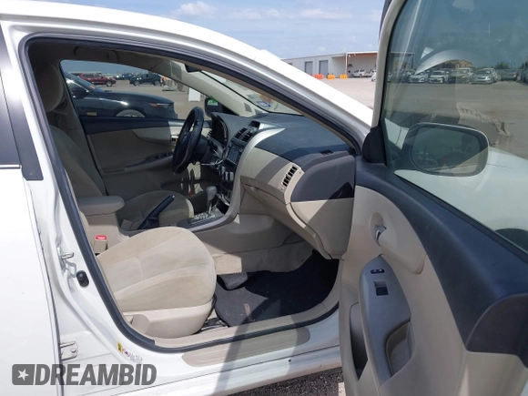2013 Toyota Corolla L with VIN 5YFBU4EE1DP090957, listed as a IAAI auction lot 41898057 with 127,438 mi miles and . Bid and sale history available at DreamBid. Image 5.