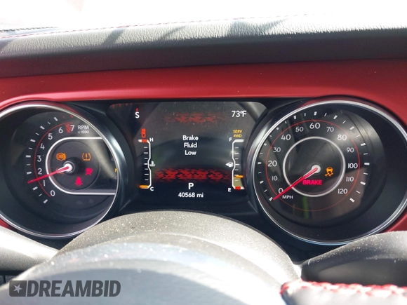 2022 Jeep Gladiator Rubicon with VIN 1C6JJTBG6NL166081, listed as a IAAI auction lot 42204431 with 40,568 mi miles and . Bid and sale history available at DreamBid. Image 7.