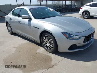 2014 Maserati Ghibli S Q4 z VIN ZAM57RTA8E1085631, wystawiony jako IAAI lot #41829745 z przebiegiem 80 418 mil mil oraz . Historia ofert i sprzedaży dostępna na DreamBid. Obrazek 1.