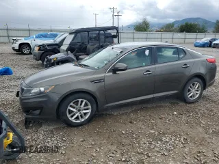 2013 Kia Optima LX z VIN 5XXGM4A72DG144112, wystawiony jako Copart lot #55880965 z przebiegiem 201 883 mil mil oraz Czysty tytuł • Clean title. Historia ofert i sprzedaży dostępna na DreamBid. Obrazek 1.