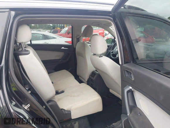 2020 Volkswagen Tiguan S with VIN 3VV1B7AX7LM102966, listed as a IAAI auction lot 42365428 with 94,921 mi miles and . Bid and sale history available at DreamBid. Image 8.