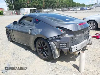 2010 Nissan 370Z Touring z VIN JN1AZ4EH1AM502464, wystawiony jako IAAI lot #42180616 z przebiegiem 145 598 mil mil oraz . Historia ofert i sprzedaży dostępna na DreamBid. Obrazek 3.