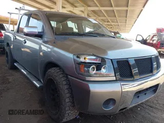 2004 Nissan Titan LE z VIN 1N6AA07A64N512108, wystawiony jako IAAI lot #42363198 z przebiegiem 251 538 mil mil oraz . Historia ofert i sprzedaży dostępna na DreamBid. Obrazek 1.