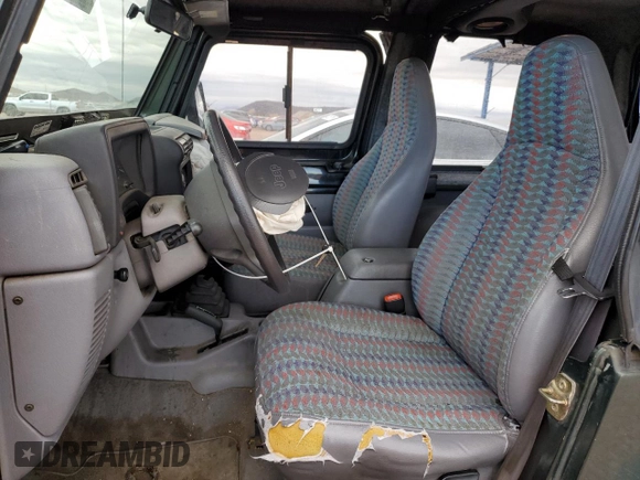 1997 Jeep Wrangler Sport with VIN 1J4FY19S6VP541852, listed as a Copart auction lot 48047235 with 163,501 mi miles and Salvage Title. Bid and sale history available at carsss.com. Image 7.