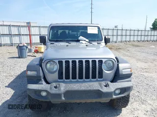 2020 Jeep Gladiator Sport S with VIN 1C6HJTAG7LL128940, listed as a IAAI auction lot 42108154 with 90,596 mi miles and . Bid and sale history available at DreamBid. Image 12.
