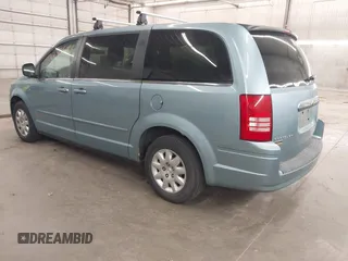 2010 Chrysler Town & Country LX with VIN 2A4RR4DE1AR285996, listed as a IAAI auction lot 42236641 with 165,772 mi miles and . Bid and sale history available at DreamBid. Image 3.