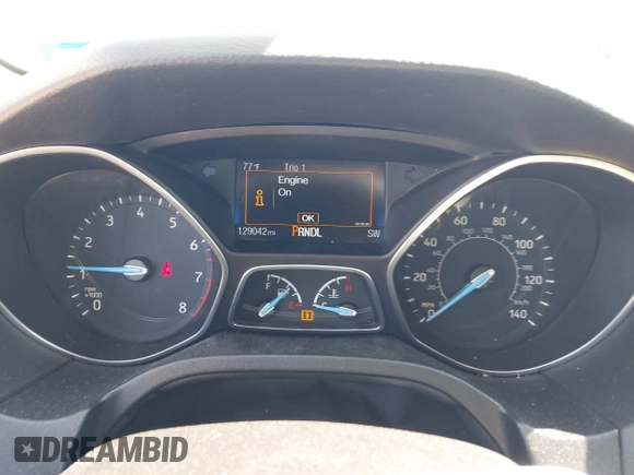 2016 Ford Focus SE with VIN 1FADP3F2XGL205797, listed as a IAAI auction lot 41987209 with 129,042 mi miles. Bid and sale history available at carsss.com. Image 7.