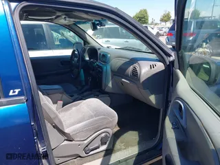 2003 Chevrolet TrailBlazer LS with VIN 1GNDS13S832174543, listed as a IAAI auction lot 42087307 with 123,519 mi miles. Bid and sale history available at carsss.com. Image 5.