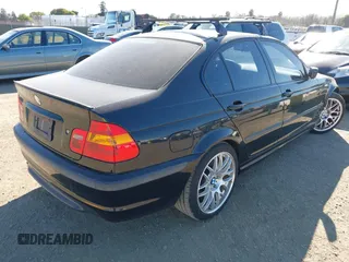 2005 BMW 3 Series 330i with VIN WBAEV53445KM41495, listed as a IAAI auction lot 41659065 with 164,868 mi miles. Bid and sale history available at carsss.com. Image 4.