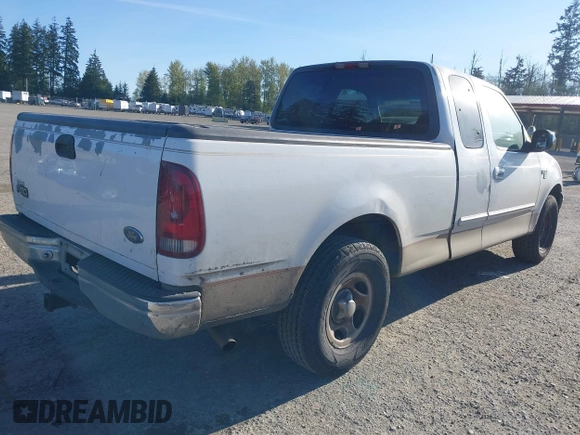 2000 Ford F-150 XL with VIN 1FTRX17W4YKA47244, listed as a IAAI auction lot 42076893 with 362,114 mi miles. Bid and sale history available at carsss.com. Image 4.