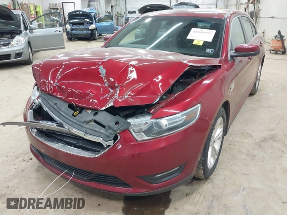 2015 Ford Taurus SEL z VIN 1FAHP2H88FG163179, wystawiony jako IAAI lot #42345579 z przebiegiem 142 424 mil mil oraz . Historia ofert i sprzedaży dostępna na DreamBid. Obrazek 6.