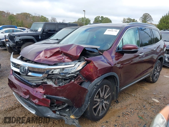 2020 Honda Pilot Touring 8-Passenger with VIN 5FNYF5H94LB012062, listed as a IAAI auction lot 40806740 with 115,431 mi miles and . Bid and sale history available at DreamBid. Image 17.