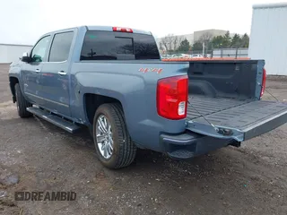 2016 Chevrolet Silverado 1500 High Country with VIN 3GCUKTEC5GG131060, listed as a IAAI auction lot 41108622 with 138,372 mi miles and . Bid and sale history available at DreamBid. Image 3.